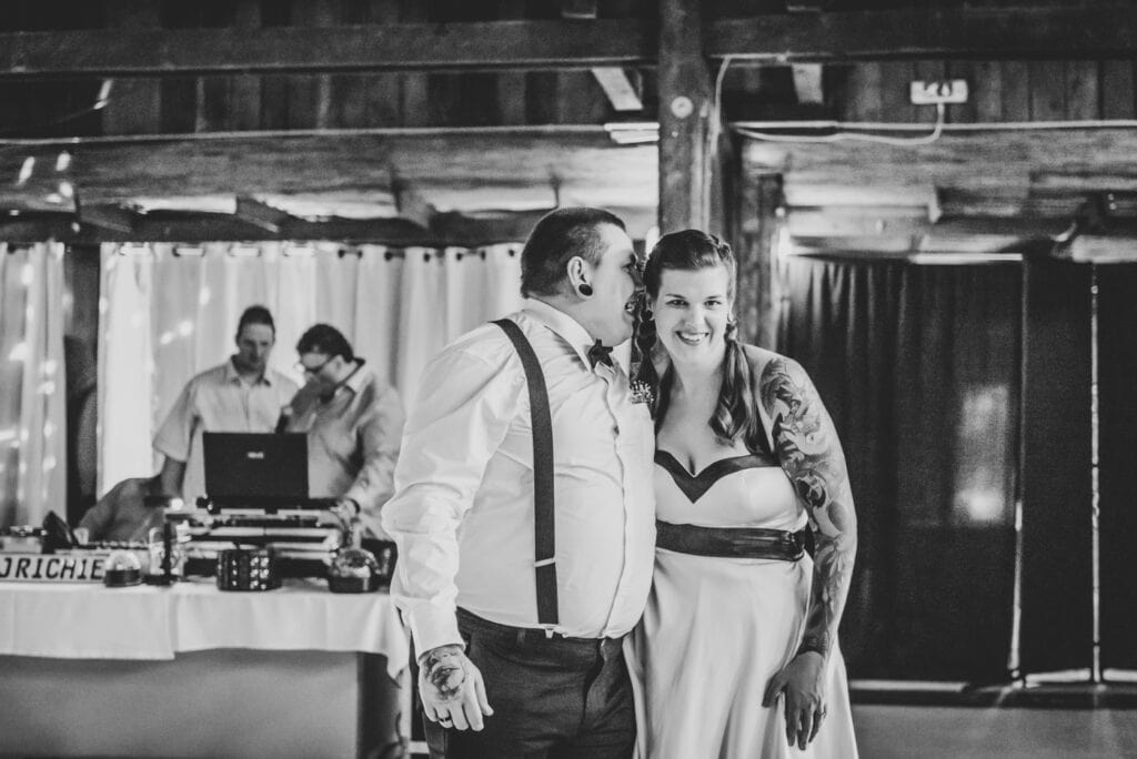 wedding couple is having a moment before their party starts