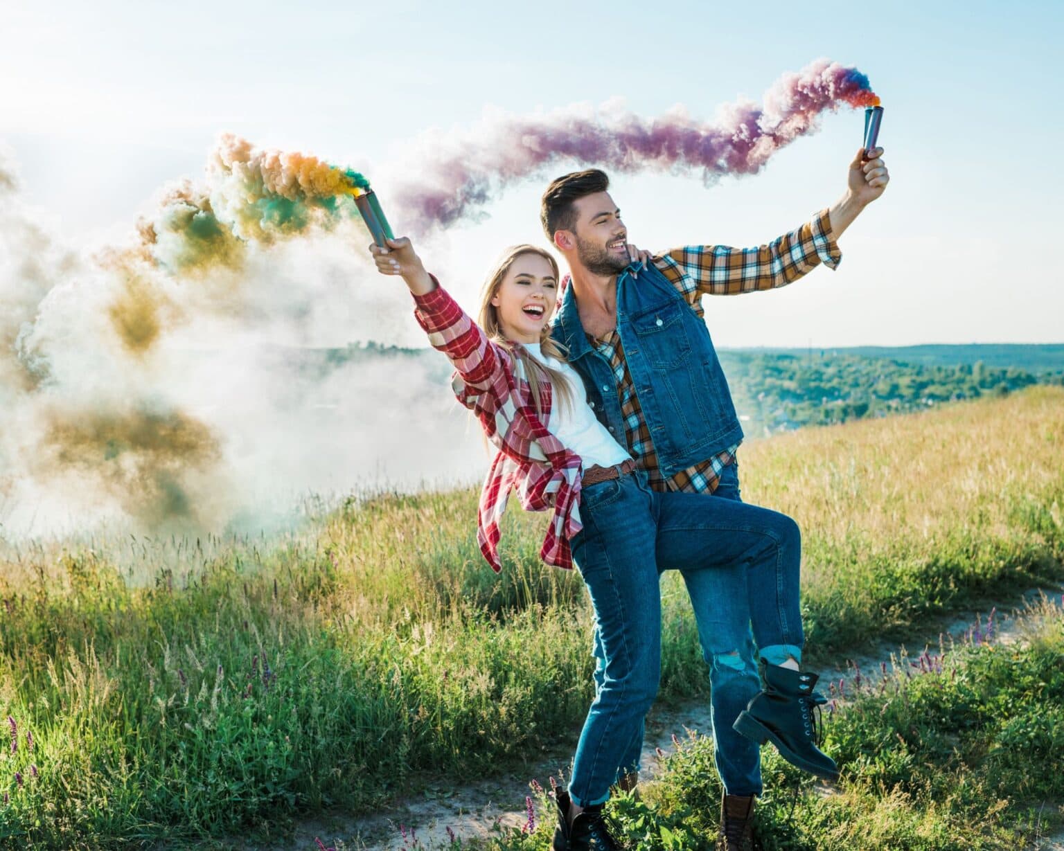 fun couple photoshoot with colourful smoke bombs