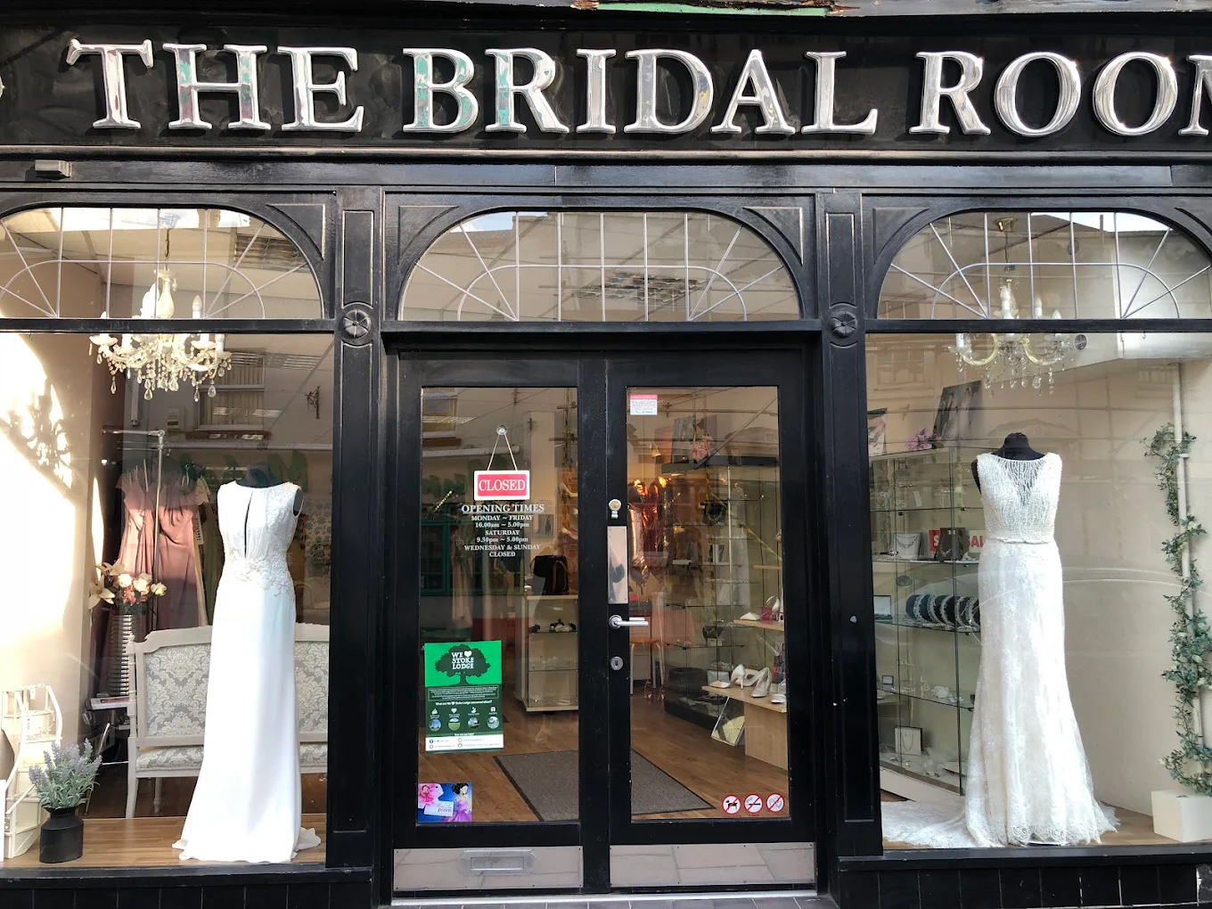 The Bridal Room Bristol boutique storefront displaying elegant wedding dresses in the shop window.
