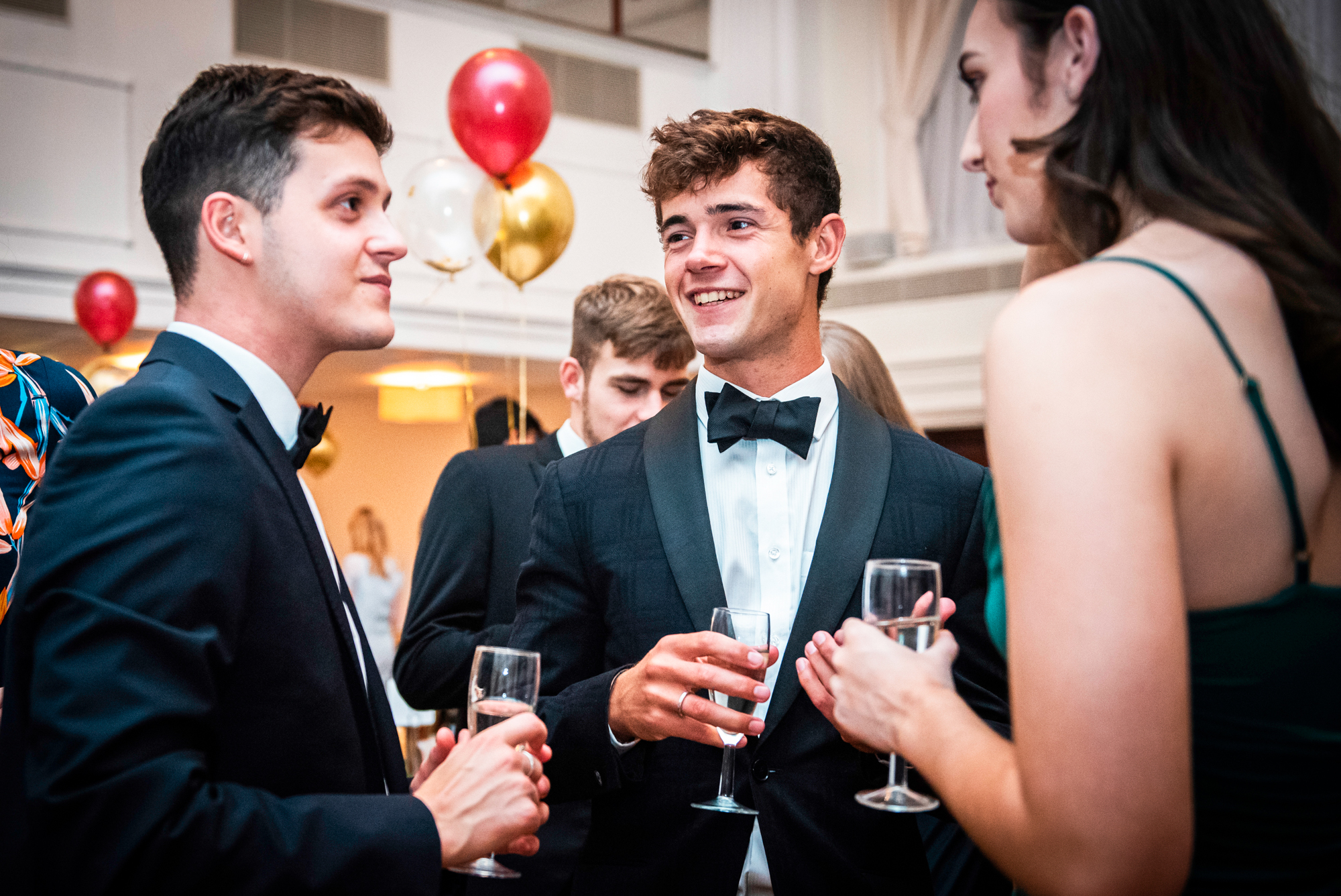 Guests in black tie chatting during the awards evening at Bristol Grand Hotel.