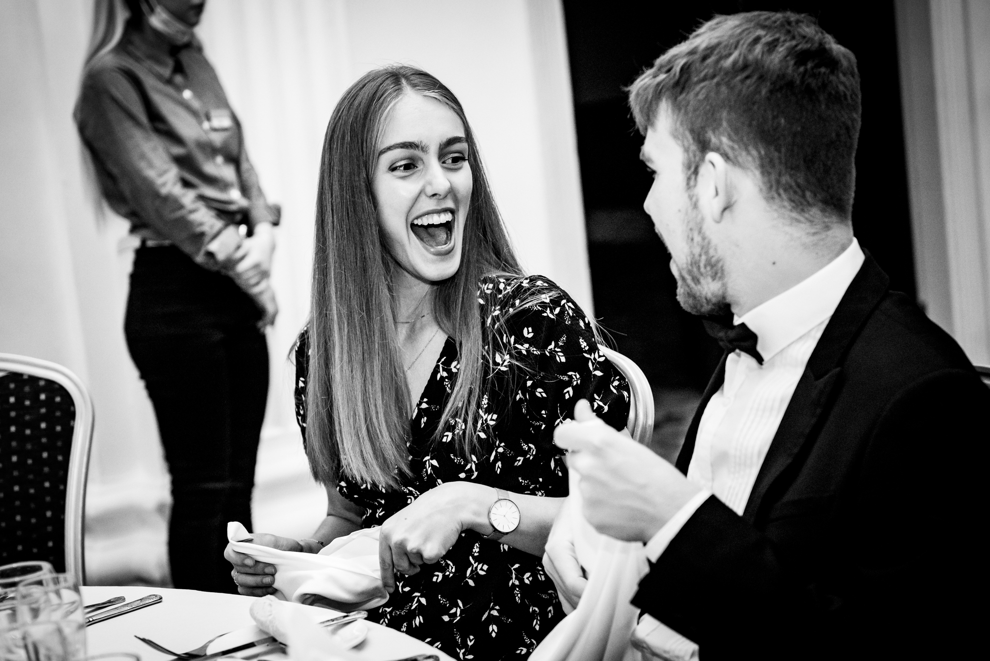 Guests reacting and laughing during the awards dinner at Bristol Grand Hotel.