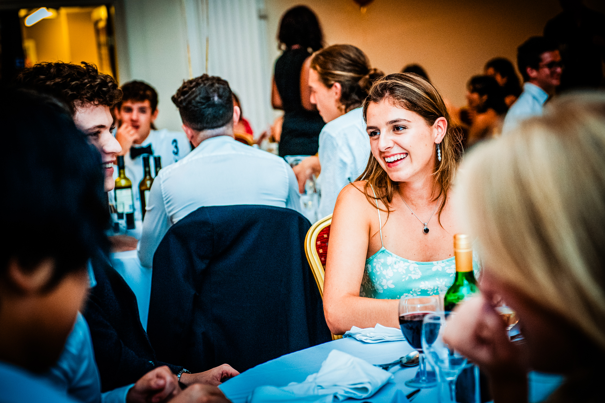 Guests smiling across the dinner table during the Galenicals Awards celebration in Bristol.