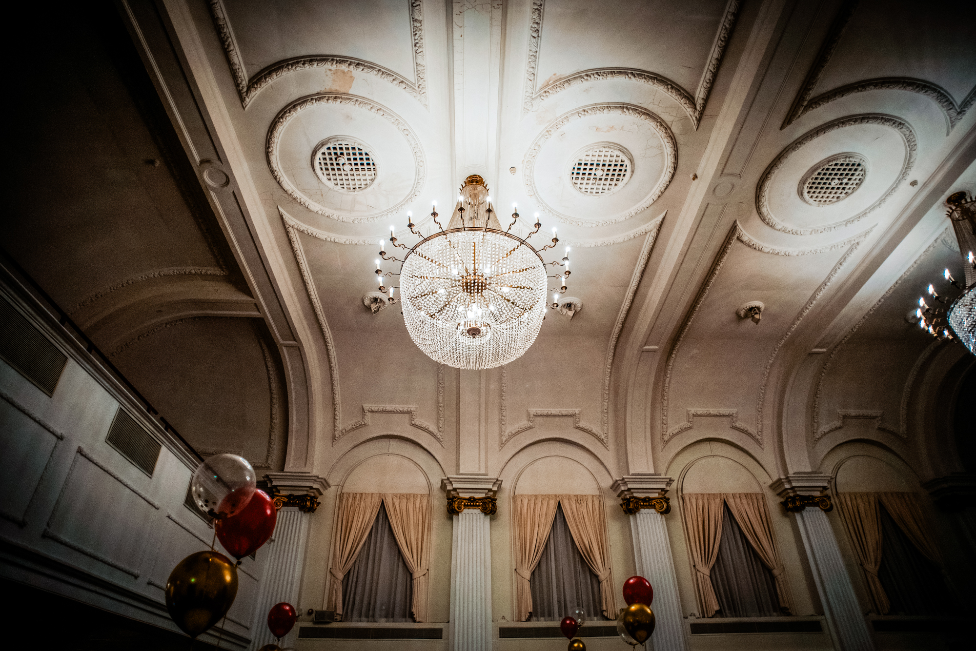 Grand chandelier and ornate ceiling inside Bristol Grand Hotel ballroom during the awards evening.