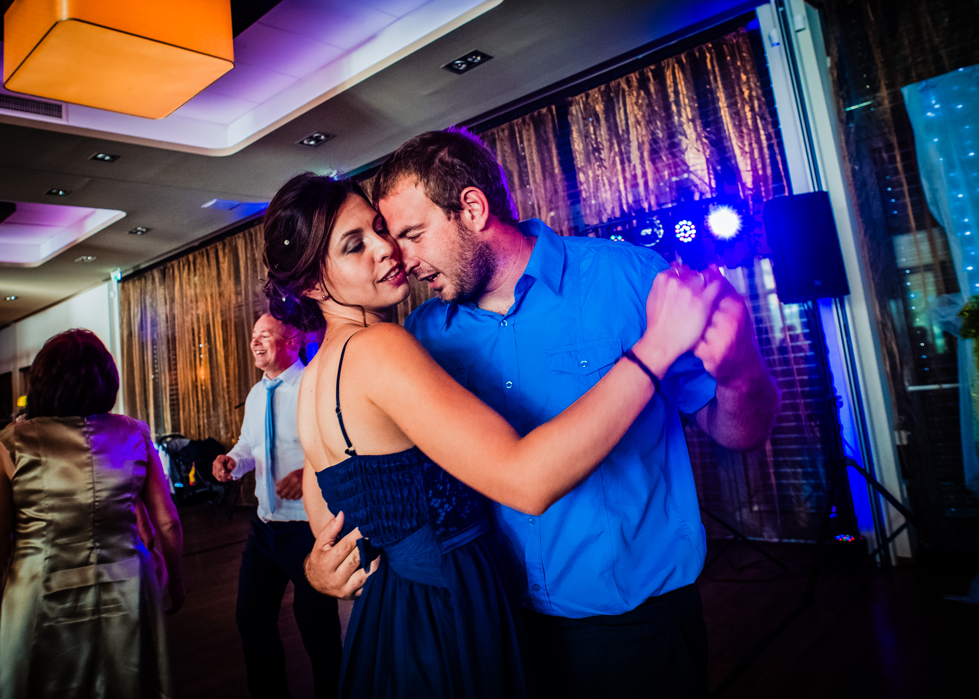 romantic close-up moment with two guests dancing on the dancefloor at a wedding.