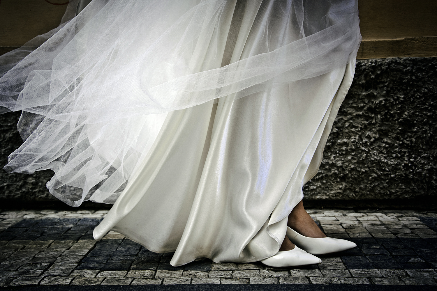 Silk wedding dress with beautiful movement in the air.