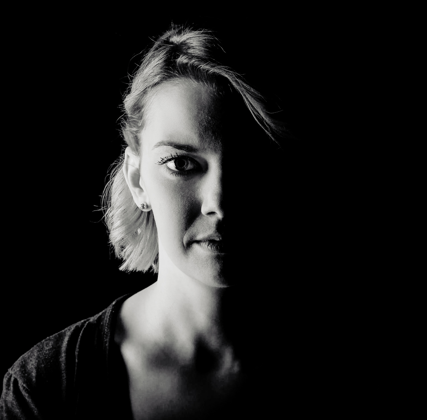 Artistic black and white portrait from Eszter, the founder of Emerald Photo UK.