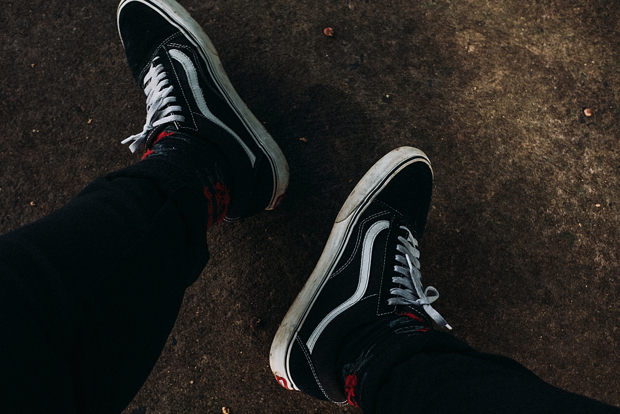 Comfortable black trainers are suitable for a wedding photographer to wear during long wedding days.