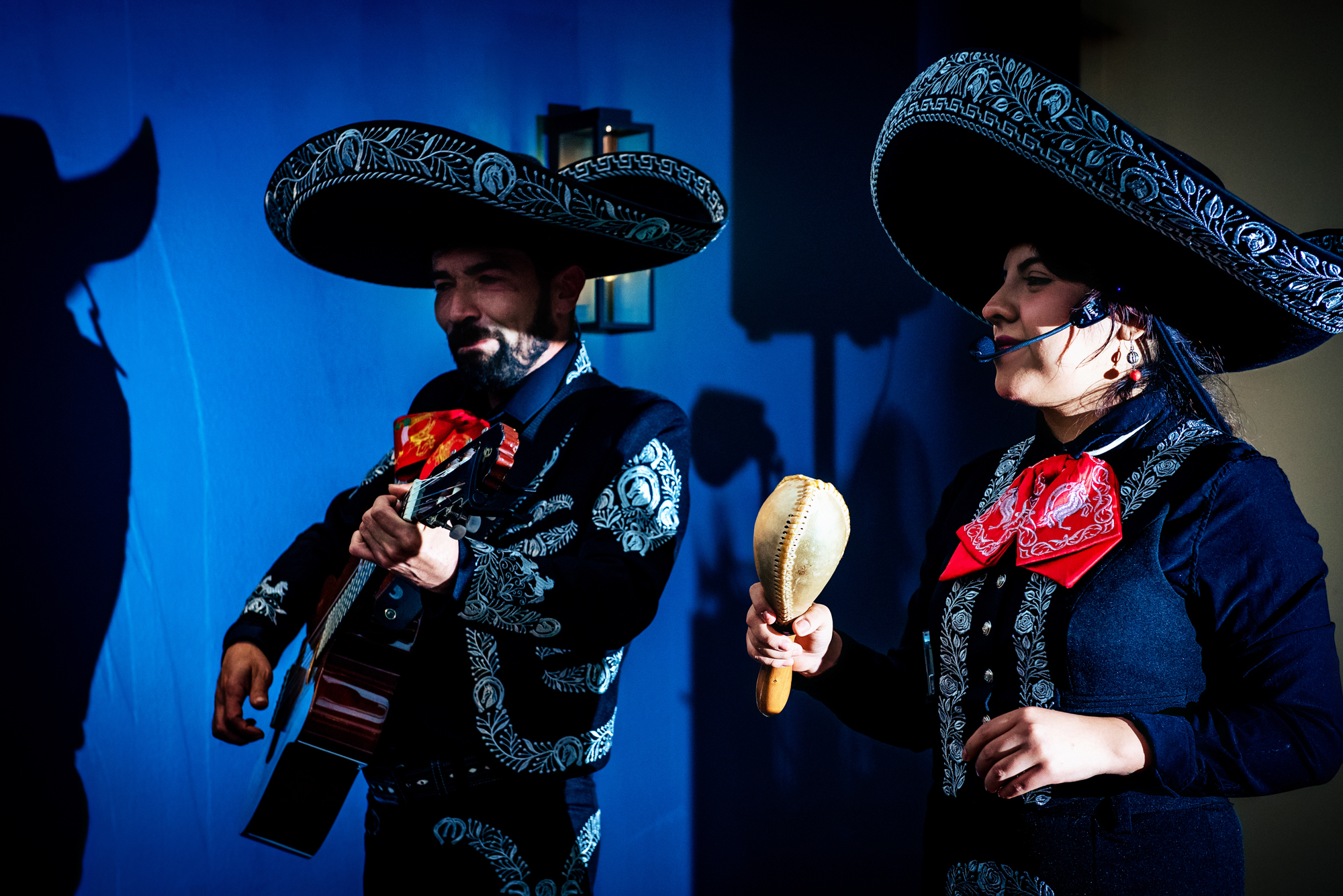 Mariachi musicians performing during wedding reception at Arnos Manor Hotel, colourful evening entertainment.