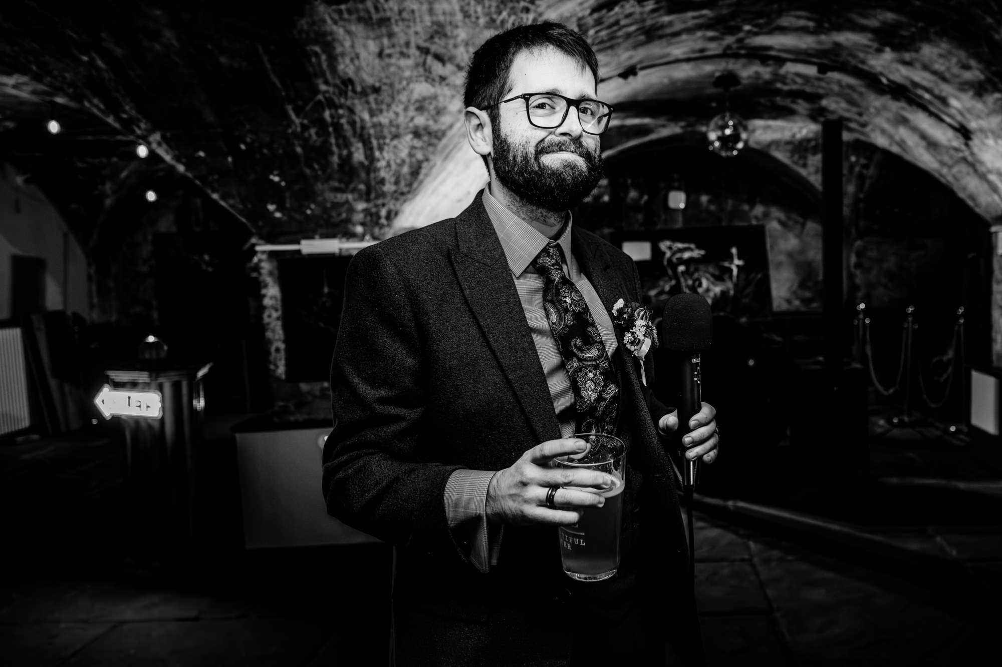 Groom speech with a glass of beer during a toast