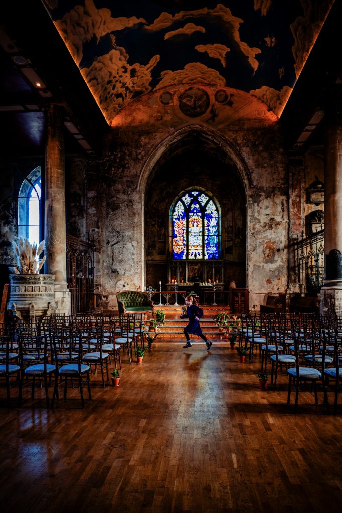 Moody candlelit reception setup with warm lighting at Mount Without Bristol wedding.