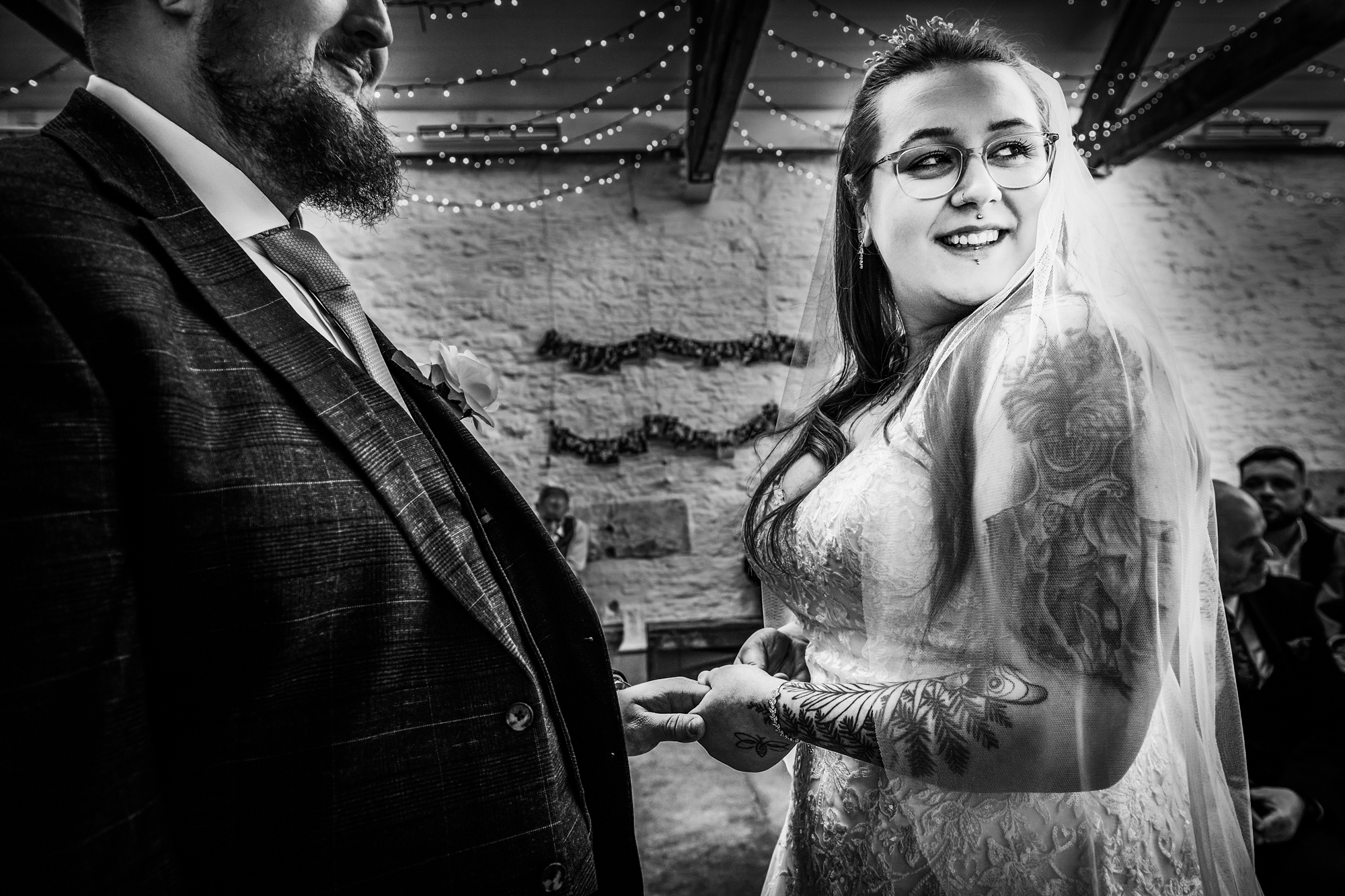 Nat smiles during the ring exchange at Silk Mill Studios in Frome.