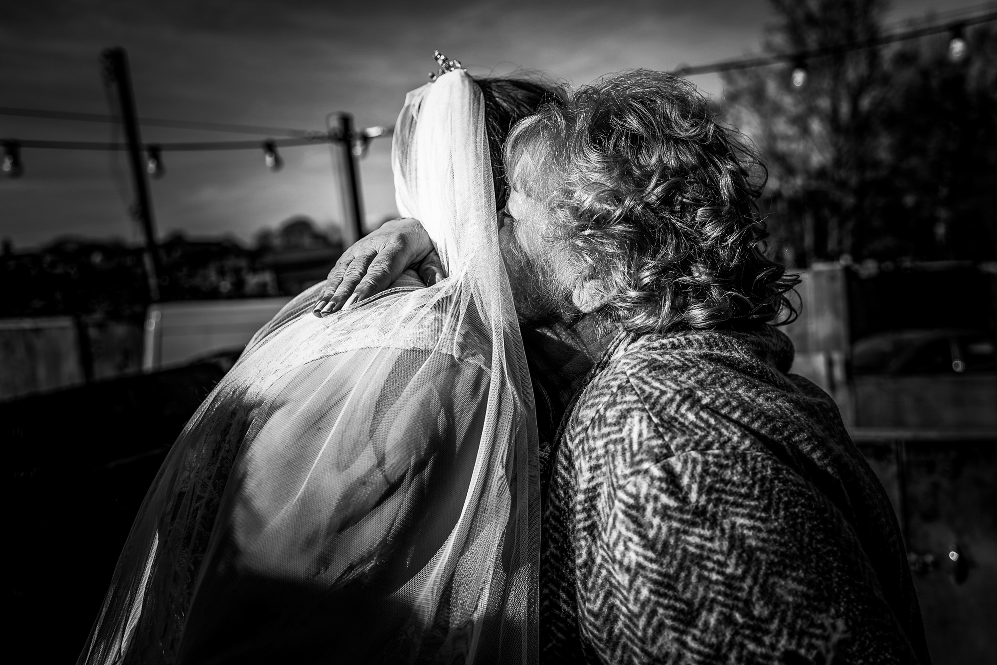 Nat hugs a guest outside Silk Mill Studios after the ceremony.