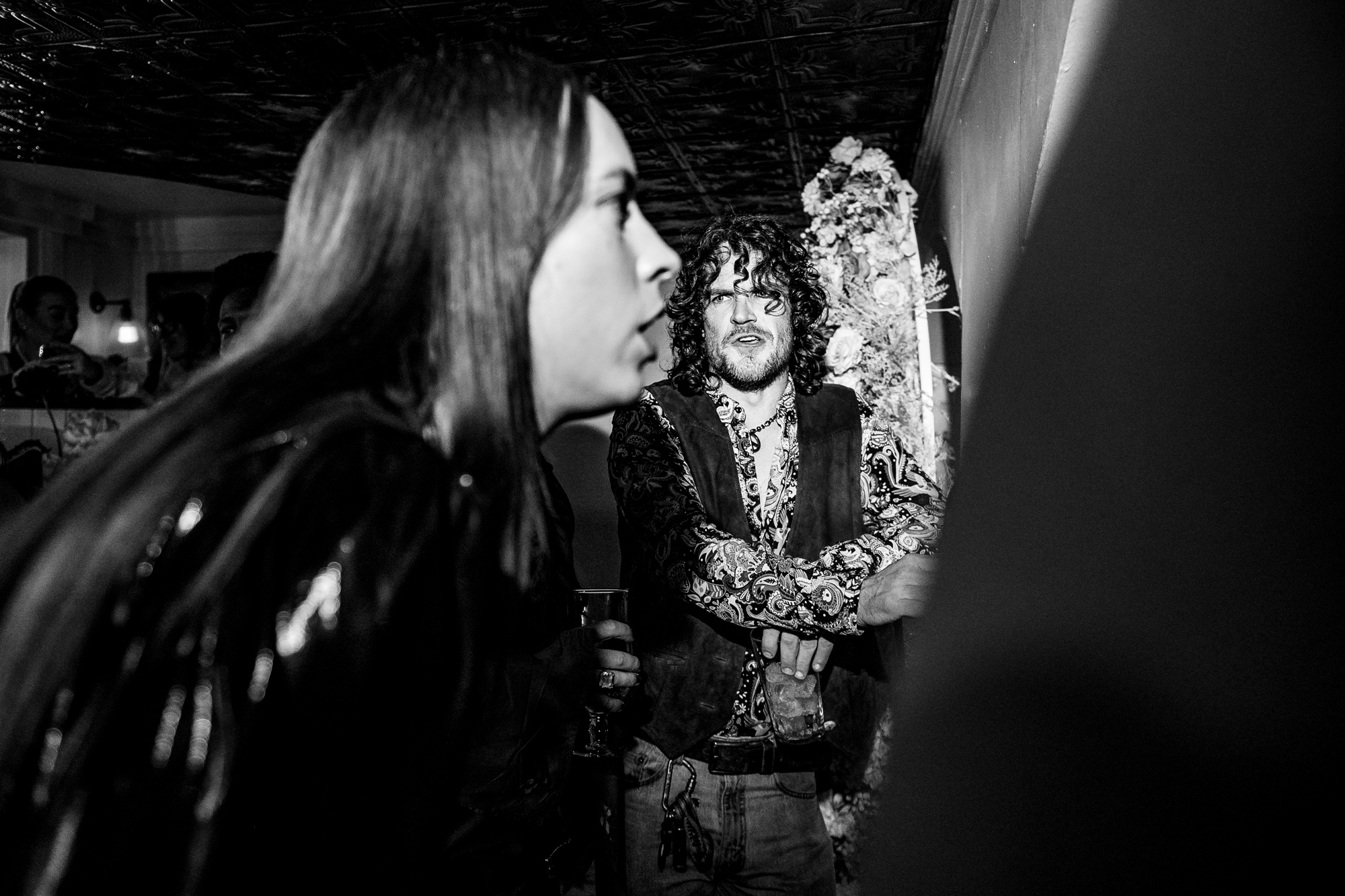 Guests chatting during the lively wedding party at Racks Bristol.