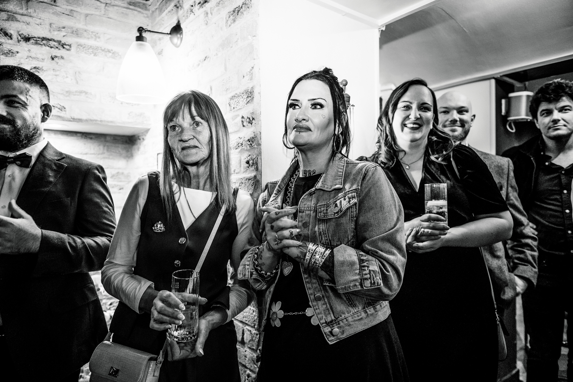 Guests watch the speeches closely in black and white inside the Playroom at Racks Bristol.