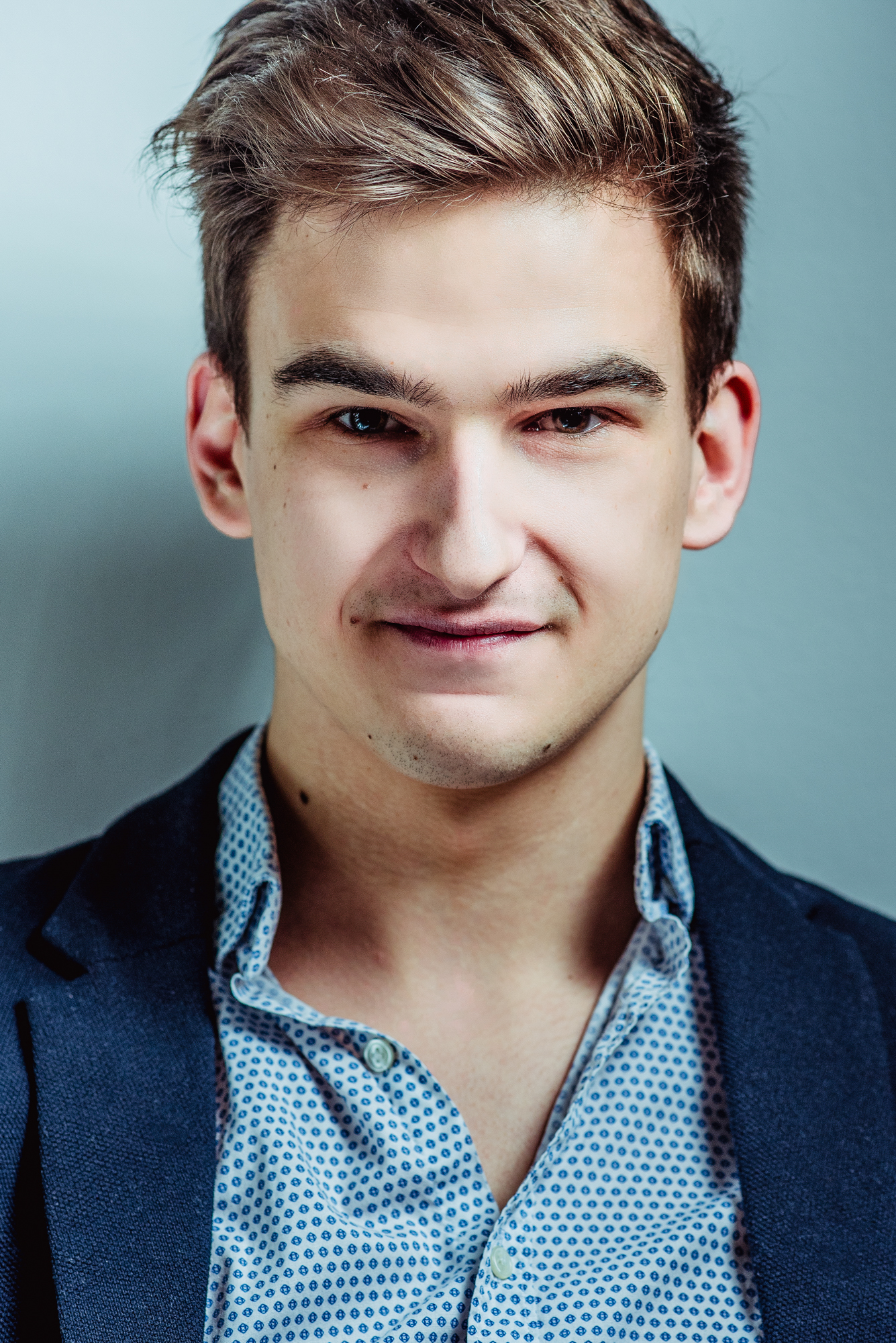 Confident headshot of Ádám in a blazer during a Personal Branding Photoshoot Budapest.